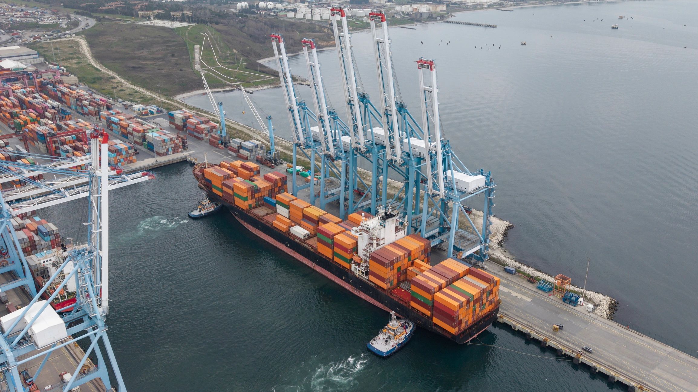 Commercial vessel receiving port-side supply support