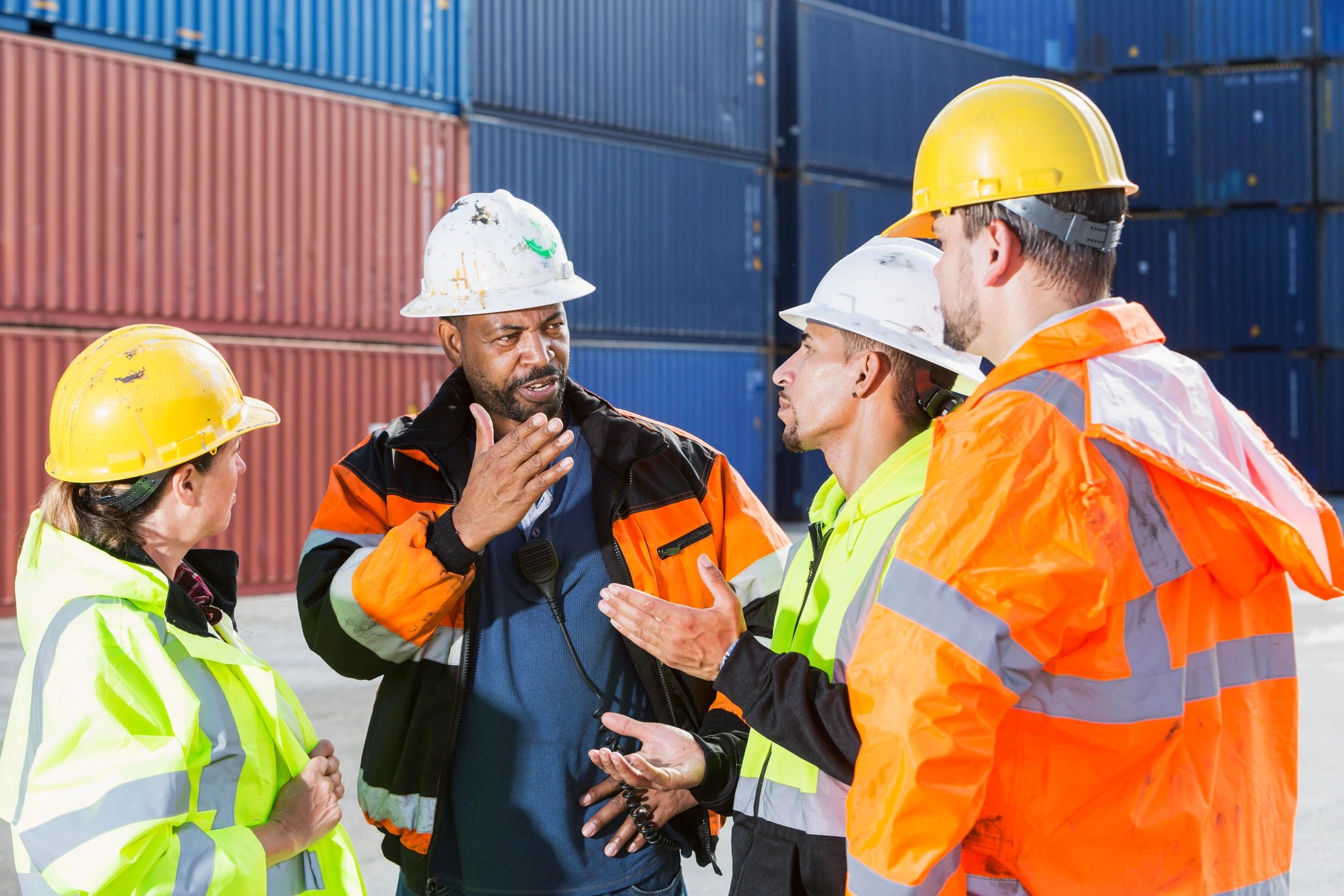 Port operations team supporting maritime crew coordination